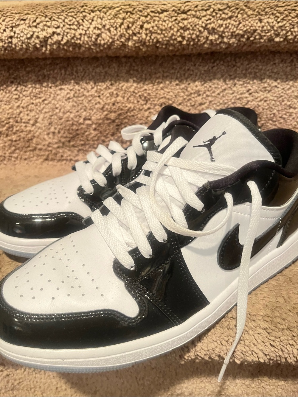 Like new preowned Air Jordan 1 Low Retro Shoes - Black/White size 9. Beautiful!